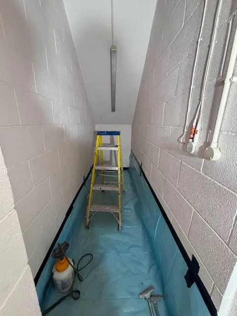 HSE-licensed asbestos gasket strip-out in E2